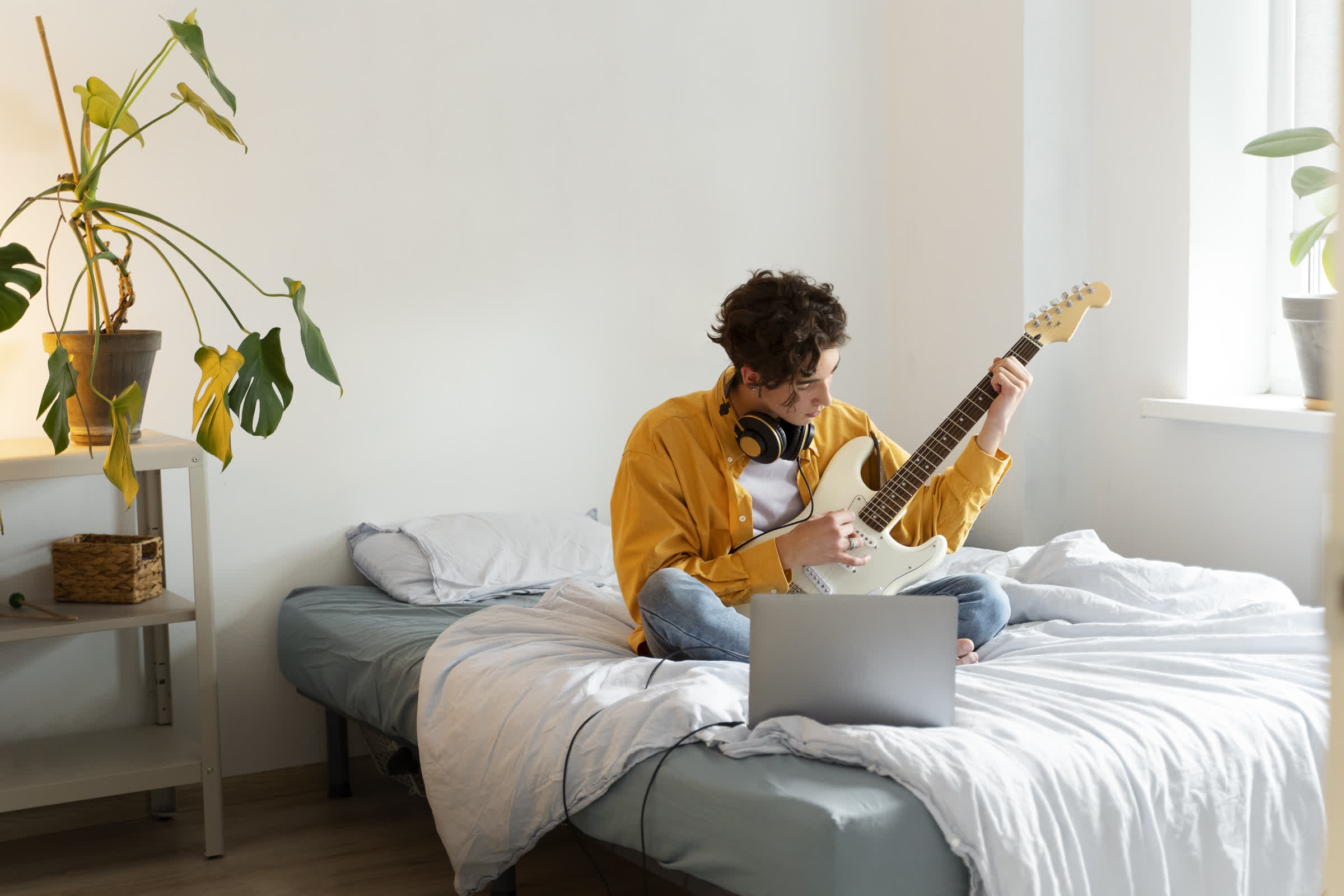 resized_full-shot-teen-making-music-home