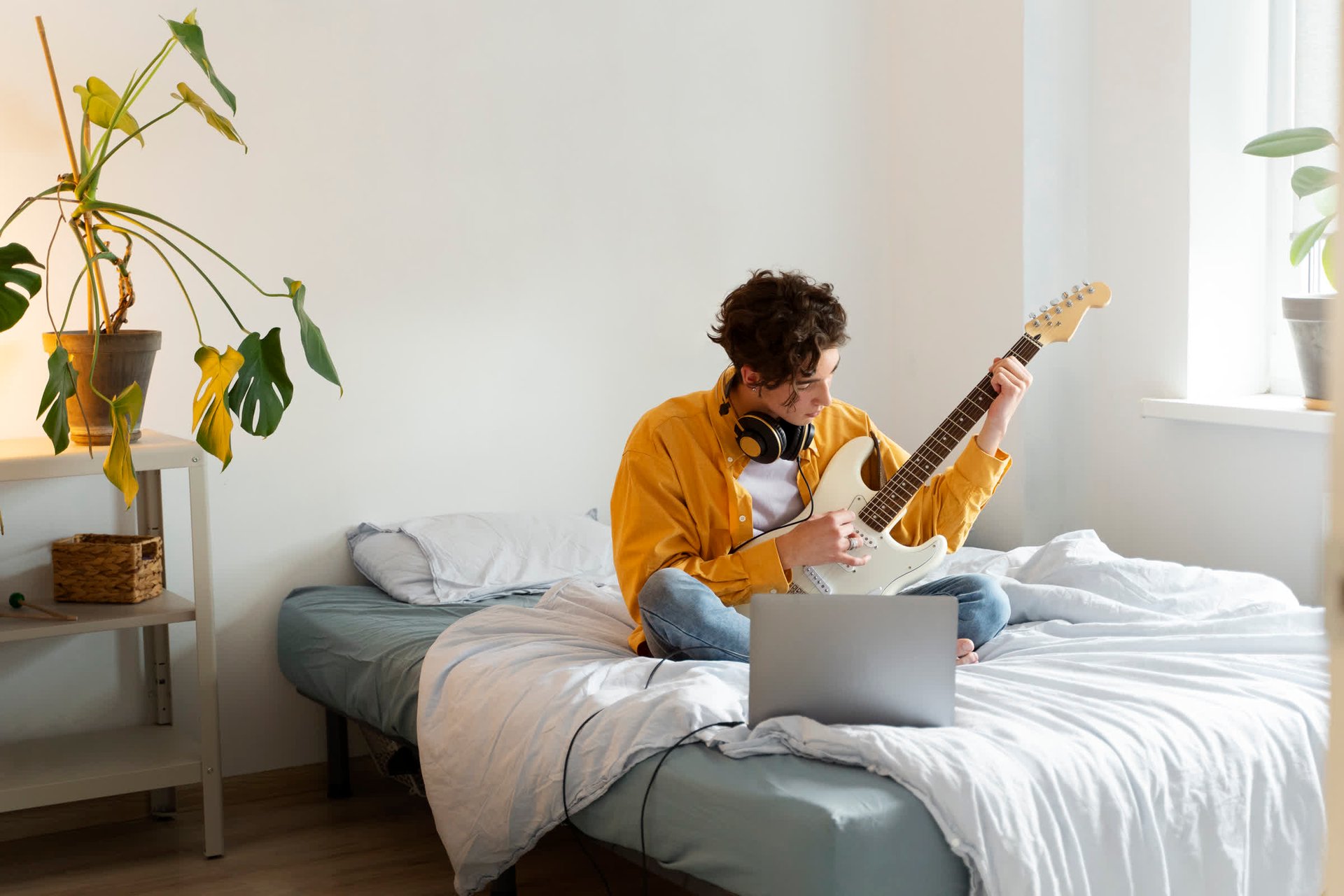 resized_full-shot-teen-making-music-home