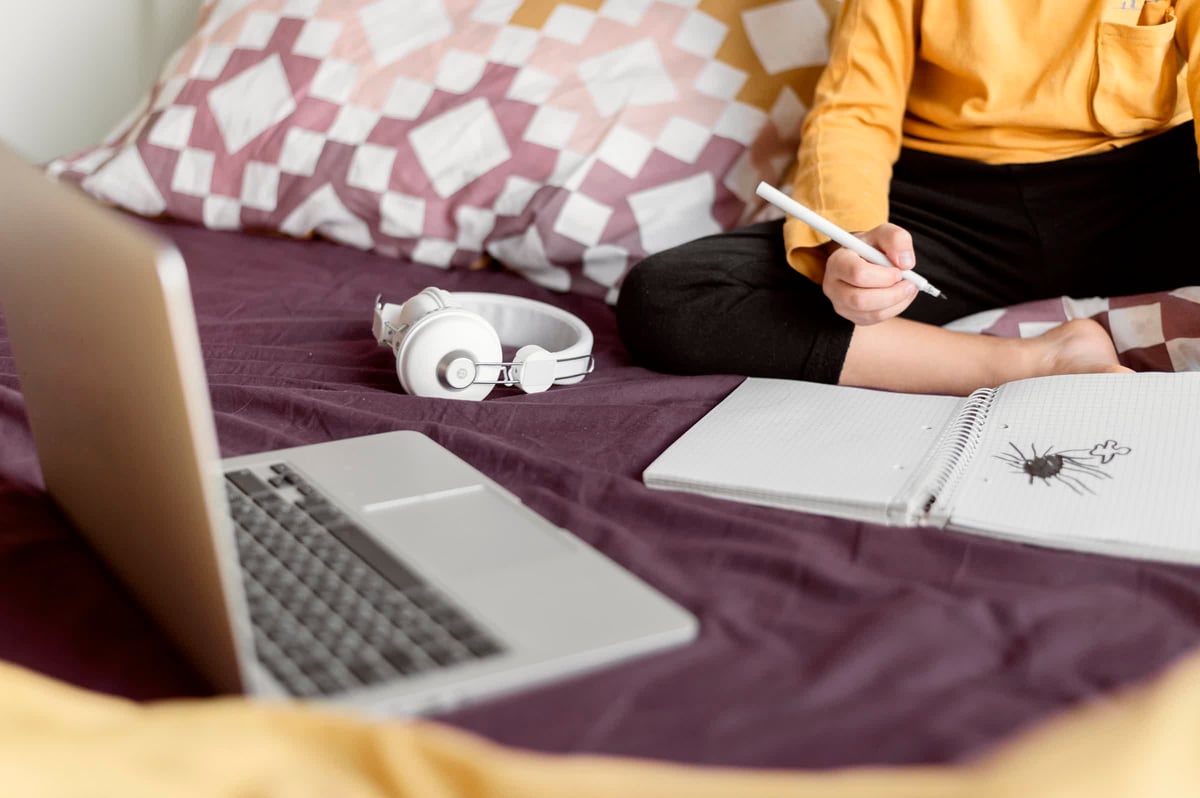 resized_school-boy-sitting-bed-his-room