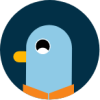 A circular icon featuring Percy the pigeon mascot, depicted as a stylised light blue bird's head with a black eye and yellow beak against a dark blue background.